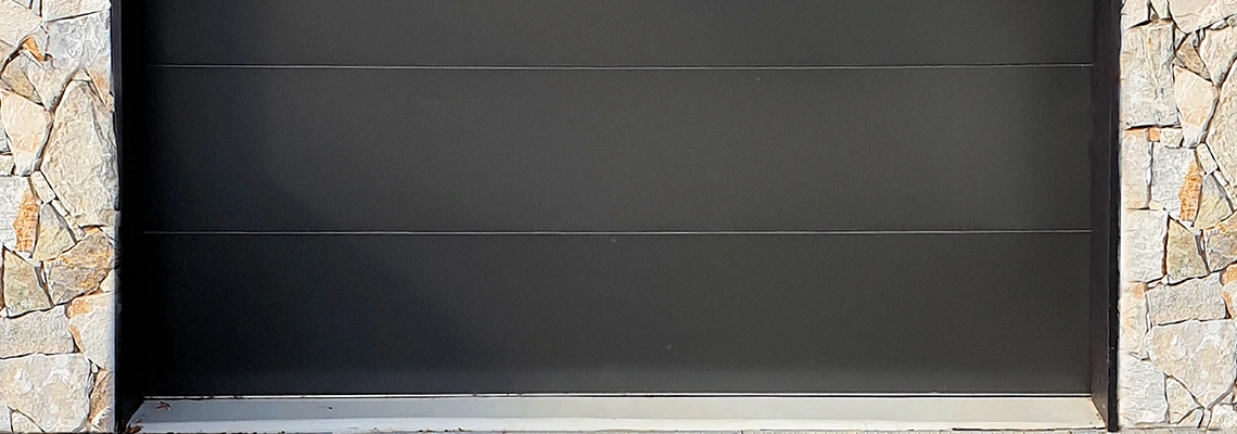 Overhead Black Garage Door Installation in Lake Worth, Florida